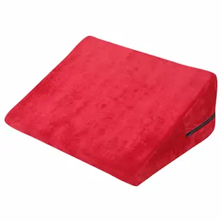 Desirel Magic Pillow – klínový sex polštář – malý (červený)